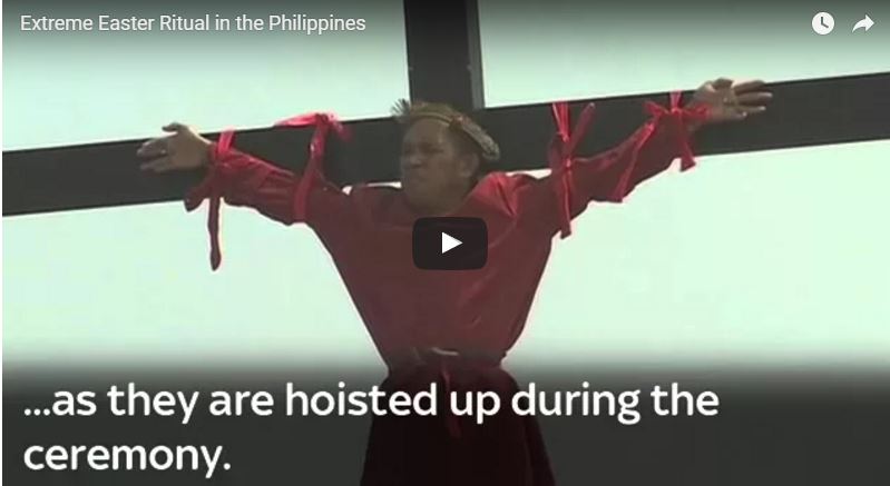 Easter Video - Philippines Devout Catholics have been nailed to wooden crosses